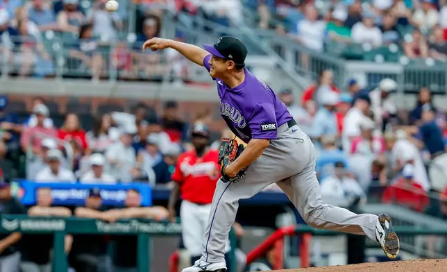 Colorado Rockies pitcher Tomoyuki Sugano delivers to an Atlanta Braves batter during the first inning of a baseball game, Friday, Aug. 28, 2026, in Atlanta. (AP Photo/Erik S. Lesser)