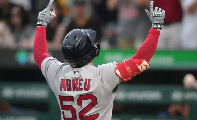 Boston Red Sox's Wilyer Abreu celebrates as he crosses home plate after hitting a solo home run off Pittsburgh Pirates pitcher Jared Jones during the second inning of a baseball game in Pittsburgh, Saturday, Aug. 15, 2026. (AP Photo/Gene J. Puskar)