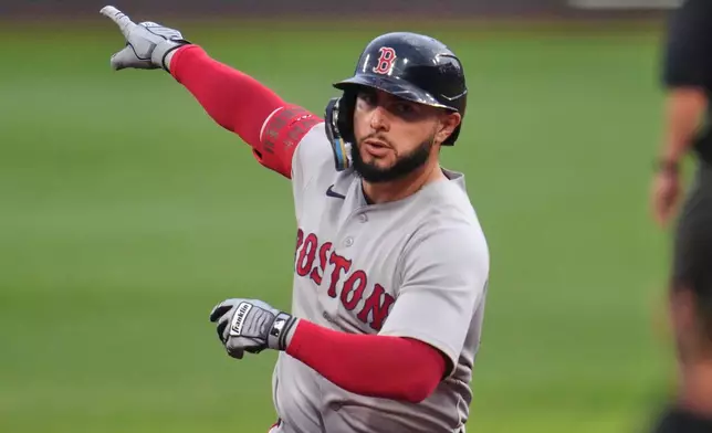 Boston Red Sox's Wilyer Abreu celebrates as he rounds the bases after hitting a solo home run off Pittsburgh Pirates pitcher Jared Jones during the second inning of a baseball game in Pittsburgh, Saturday, Aug. 15, 2026. (AP Photo/Gene J. Puskar)