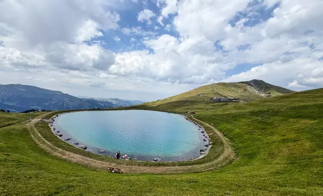 A water reservoirs for snowmaking photographed at the Lenk valley near Adelboden, Switzerland, Monday, Aug. 3, 2026. (AP Photo/Hernan Munoz)