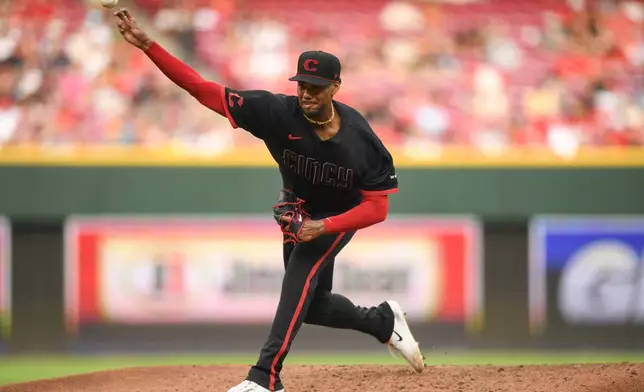Cincinnati Reds' Hunter Greene pitches during the third inning of a baseball game against the Pittsburgh Pirates on Friday, July 31, 2026 in Cincinnati. (AP Photo/Tanner Pearson)