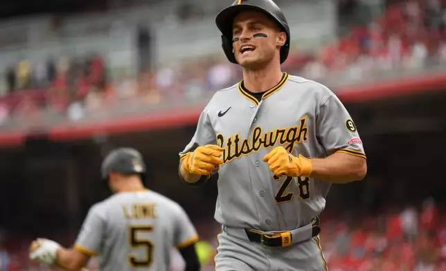 Pittsburgh Pirates' Jake Mangum celebrates after a solo home run during the second inning of a baseball game against the Cincinnati Reds on Friday, July 31, 2026 in Cincinnati. (AP Photo/Tanner Pearson)