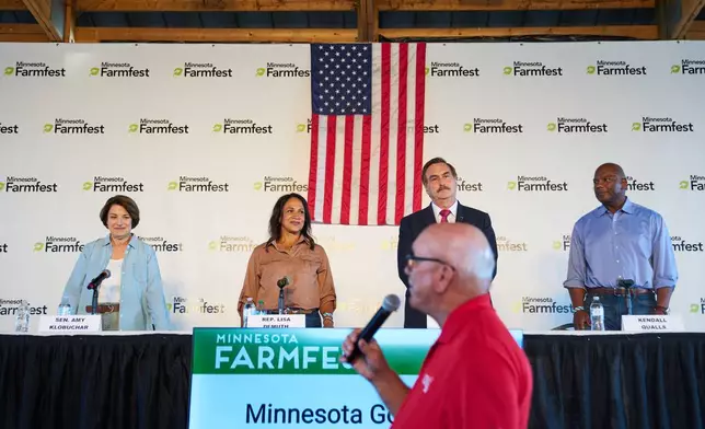 Candidates for Minnesota governor, from left, Sen. Amy Klobuchar, D-Minn., Minnesota House Speaker Lisa Demuth, Mike Lindell and Kendall Qualls participate in a forum at Farmfest, Wednesday, Aug. 5, 2026, in Morgan, Minn. (AP Photo/Ellen Schmidt)
