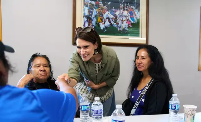 Minnesota Lt. Gov. Peggy Flanagan, a Democratic candidate for U.S. Senate, greets supporters during a campaign event at the Leech Lake Band of Ojibwe Twin Cities Office in Minneapolis, Saturday, Aug. 8, 2026. (AP Photo/Ellen Schmidt)