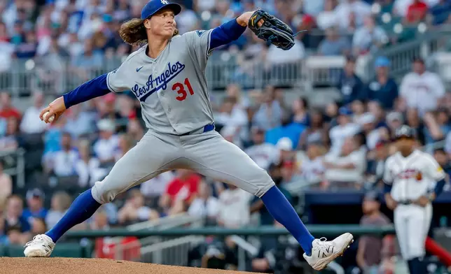 Los Angeles Dodgers pitcher Tyler Glasnow delivers to an Atlanta Braves batter during the first inning of a baseball game, Tuesday, Aug. 25, 2026, in Atlanta. (AP Photo/Erik S. Lesser)