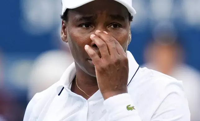 Venus Williams reacts while playing against Kamilla Rakhimova during the National Bank Open tennis tournament in Toronto, Sunday, Aug. 2, 2026. (Chris Young/The Canadian Press via AP)