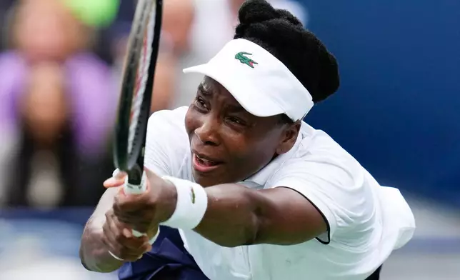 Venus Williams plays a return against Kamilla Rakhimova during the National Bank Open tennis tournament in Toronto, Sunday, Aug. 2, 2026. (Chris Young/The Canadian Press via AP)
