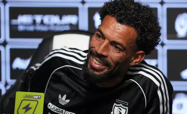 Cape Verde goalkeeper Vozinha is presented as a new player for Colo Colo during a press conference at Monumental stadium in Santiago, Chile, Tuesday, Aug. 4, 2026. (AP Photo/Esteban Felix)