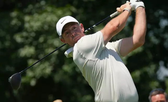 Rory McIlroy, of Northern Ireland, hits from the fifth tee during the first round of the BMW Championship golf tournament Thursday, Aug. 20, 2026, in St. Louis. (AP Photo/Jeff Roberson)