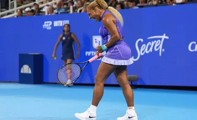 Serena Williams, of the United States, reacts to a winning point during a women's doubles match against Marta Kostyuk, of Ukraine, and Peyton Stearns, of the United States, at the Cincinnati Open tennis tournament, Monday, Aug. 17, 2026, in Mason, Ohio. (AP Photo/Kareem Elgazzar)
