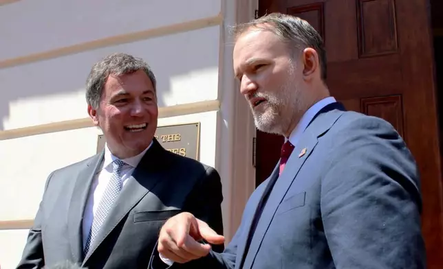 Canada-U.S. Trade Minister Dominic LeBlanc, left, and United States Trade Representative Jamieson Greer, speak to reporters in Washington, D.C., on Wednesday, Aug. 19, 2026, the day after the Trump administration temporarily delayed tariffs on Canada. (Kelly Geraldine Malone/The Canadian Press via AP)