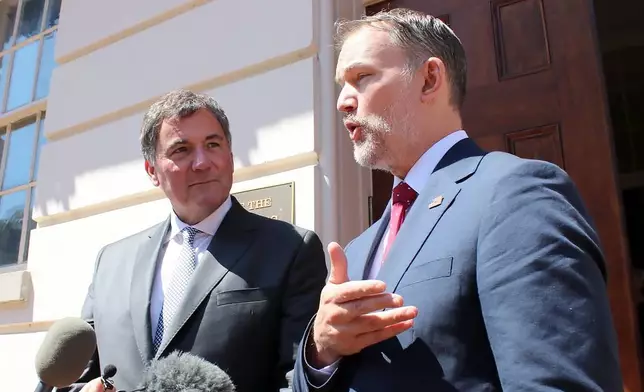 Canada-U.S. Trade Minister Dominic LeBlanc, left, and United States Trade Representative Jamieson Greer, speak to reporters in Washington, D.C., on Wednesday, Aug. 19, 2026, the day after the Trump administration temporarily delayed tariffs on Canada. (Kelly Geraldine Malone/The Canadian Press via AP)