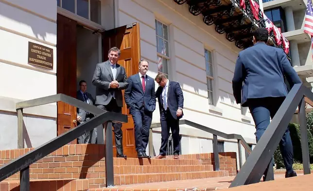 Canada-U.S. Trade Minister Dominic LeBlanc, centre left, and United States Trade Representative Jamieson Greer, leave a meeting in Washington, D.C., on Wednesday, Aug. 19, 2026, the day after the Trump administration temporarily delayed tariffs on Canada. (Kelly Geraldine Malone/The Canadian Press via AP)