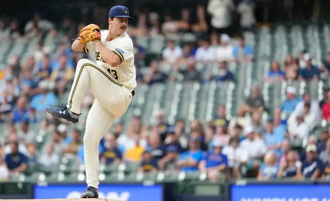 Milwaukee Brewers' Logan Henderson pitches during the first inning of a baseball game against the Pittsburgh Pirates, Tuesday, Aug. 4, 2026, in Milwaukee. (AP Photo/Aaron Gash)