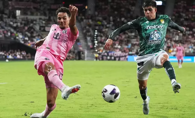 Inter Miami defender Ian Fray, left, passes the ball as Club León midfielder Sebastian Santos, right, defends during the first half of a Leagues Cup soccer match, Wednesday, Aug. 12, 2026, in Miami. (AP Photo/Lynne Sladky)
