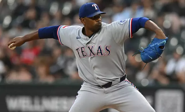 Texas Rangers starter Kumar Rocker delivers a pitch during the first inning of a baseball game against the Chicago White Sox in Chicago, Monday, Aug. 24, 2026. (AP Photo/Paul Beaty)