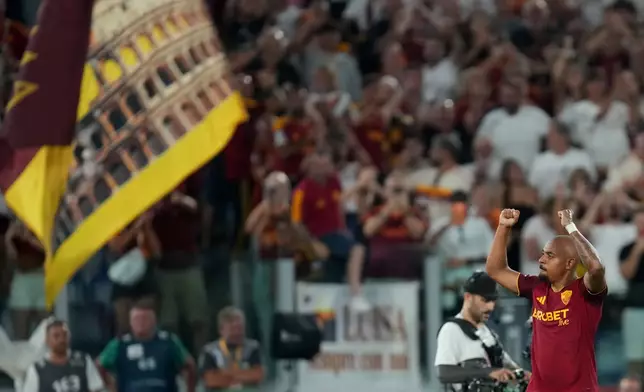 Roma's Donyell Malen celebrates after scoring during the Italian Serie A soccer match between Roma and Fiorentina, in Rome, Monday, Aug. 24, 2026. (AP Photo/Gregorio Borgia)