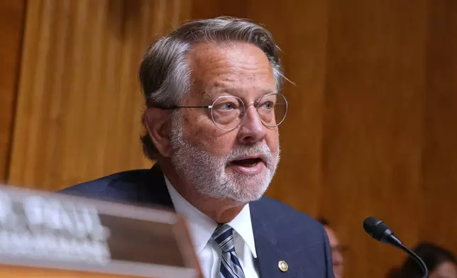 Sen. Gary Peters, D-Mich., speaks as Dr. Anthony Fauci appears before the Senate Homeland Security and Governmental Affairs Committee at the Capitol, Wednesday, July 29, 2026, in Washington. (AP Photo/Allison Robbert)