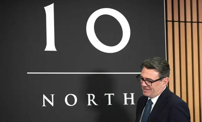 Britain's Prime Minister Andy Burnham arrives to hold a National Economic Council meeting at No 10 North at Heron House in Manchester, England. Friday July 24, 2026. (Christopher Furlong/Pool Photo via AP)
