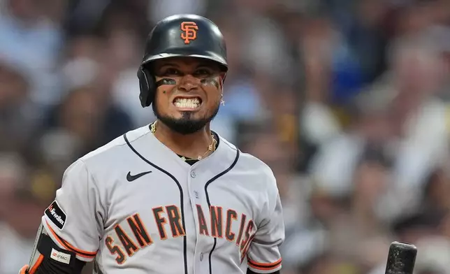 San Francisco Giants' Luis Arraez reacts while batting during the fourth inning of a baseball game against the San Diego Padres Thursday, July 30, 2026, in San Diego. (AP Photo/Gregory Bull)