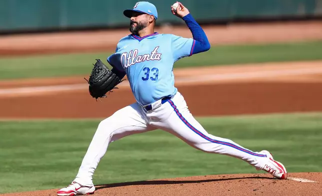 Atlanta Braves pitcher Martín Pérez (33) delivers in the first inning of a baseball game against the Colorado Rockies, Saturday, Aug. 29, 2026, in Atlanta. (AP Photo/Colin Hubbard)