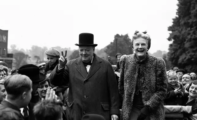 FILE - Britain's Prime Minister Winston Churchill and his wife Clementine tour Churchill's constituency of Woodford, in Essex, England, as part of the Conservative's General Election campaign, May 26, 1945. (AP Photo/Eddie Worth, File)