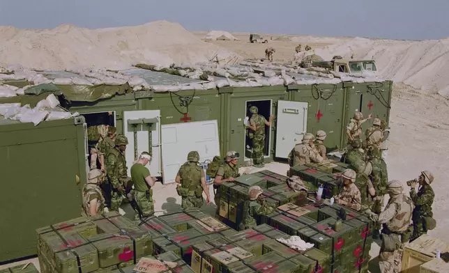 FILE - A U.S. Marine field hospital is set up in the Saudi Arabian Desert on Jan. 17, 1991, as part of Operation Desert Storm. (AP Photo/Mikami, File)