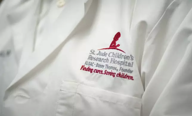 St. Jude Children's Medical Research Center CEO Dr. Charles Roberts' lab coat is seen on Monday, Aug. 17, 2026, in the Danny Thomas Research Center in Memphis, Tenn. (AP Photo/Kevin Wurm)
