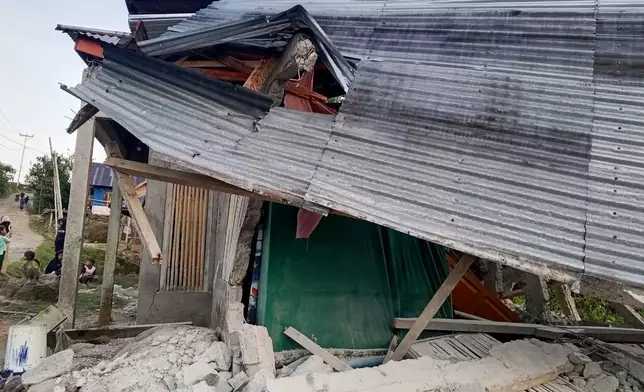 A building is seen damaged following an earthquake in East Manggarai, East Nusa Tenggara province, Indonesia, Saturday, Aug. 15, 2026. (AP Photo/Kurniawan)