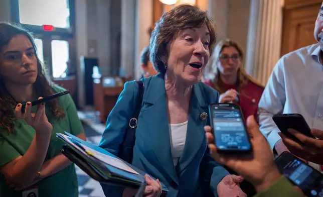 FILE -Sen. Susan Collins, R-Maine, responds to reporters at the Capitol in Washington, July 14, 2026. (AP Photo/J. Scott Applewhite, File)