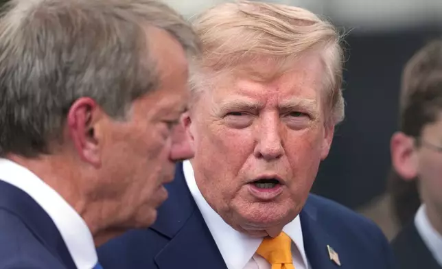 President Donald Trump speaks with Nebraska Gov. Jim Pillen after a back to school event in the Rose Garden of the White House, Monday, Aug. 24, 2026, in Washington. (AP Photo/Alex Brandon)
