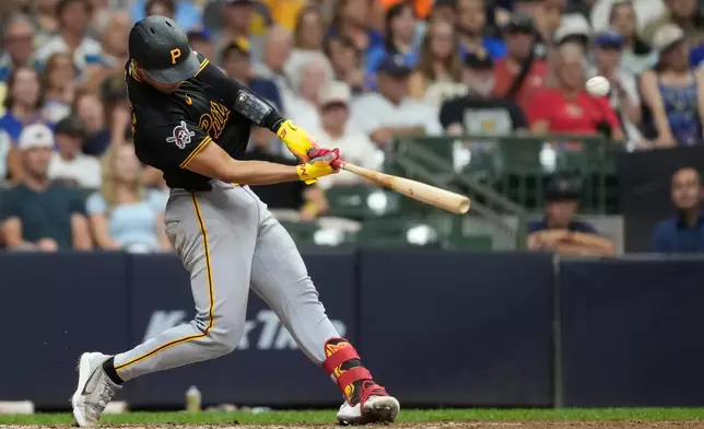 Pittsburgh Pirates' Endy Rodríguez hits a two-run home run during the seventh inning of a baseball game against the Milwaukee Brewers, Wednesday, Aug. 5, 2026, in Milwaukee. (AP Photo/Aaron Gash)