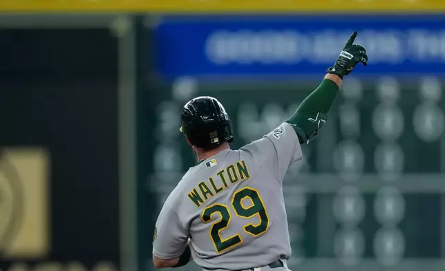 Athletics' Donovan Walton runs the bases after hitting a solo home run during the third inning of a baseball game against the Houston Astros, Saturday, Aug. 22, 2026, in Houston. (AP Photo/Kevin M. Cox)