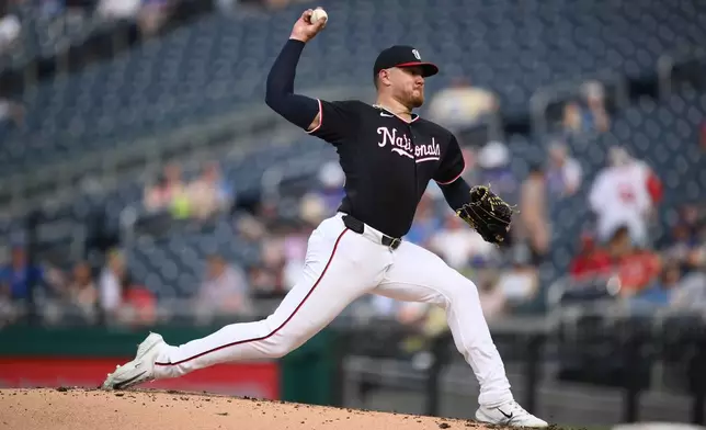 Washington Nationals pitcher Cade Cavalli throws during the third inning of a baseball game against the Chicago Cubs, Thursday, Aug. 13, 2026, in Washington. (AP Photo/Nick Wass)