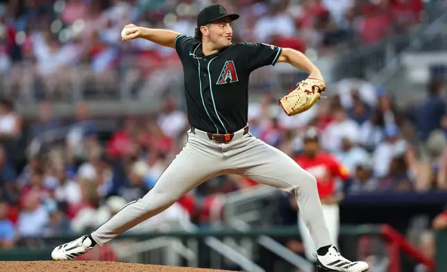 Arizona Diamondbacks pitcher Brandon Pfaadt delivers in the third inning of a baseball game against the Atlanta Braves, Friday, Aug. 14, 2026, in Atlanta. (AP Photo/Colin Hubbard)
