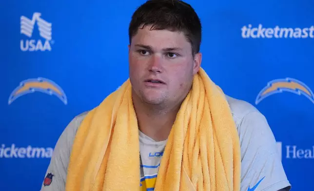 Los Angeles Chargers offensive tackle Joe Alt speaks during an NFL football training camp Wednesday, Aug. 5, 2026, in San Diego. (AP Photo/Gregory Bull)