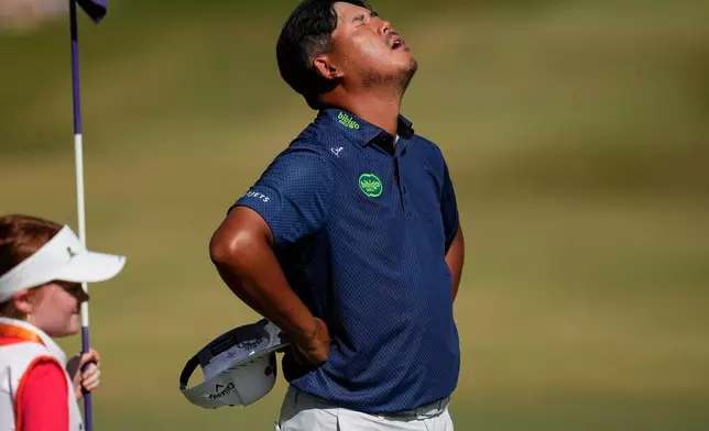 Scottie Scheffler hits from the 14th tee during the final round of the St. Jude Championship golf tournament, Sunday, Aug. 16, 2026, in Memphis, Tenn. (AP Photo/George Walker IV)