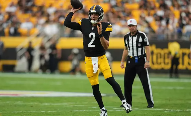 Pittsburgh Steelers quarterback Mason Rudolph throws a pass in the first half of a preseason NFL football game against the Green Bay Packers in Pittsburgh, Thursday, Aug. 13, 2026. (AP Photo/Gene J. Puskar)