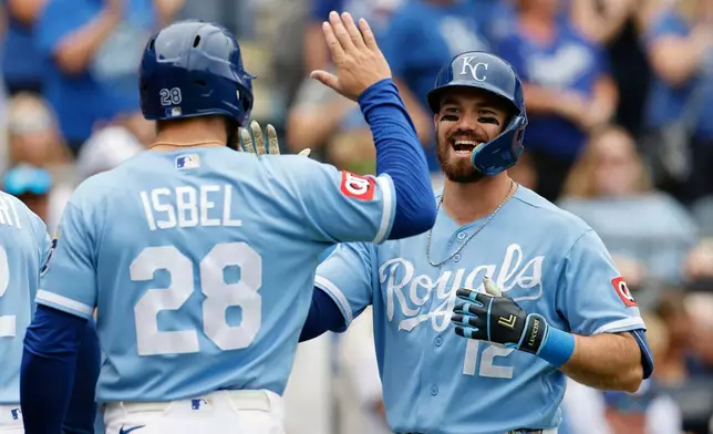 Kansas City Royals' Nick Loftin (12) celebrates after his three-run home run with Kyle Isbel (28) during the second inning of a baseball game against the Detroit Tigers in Kansas City, Mo., Sunday, Aug. 23, 2026. (AP Photo/Colin E. Braley)