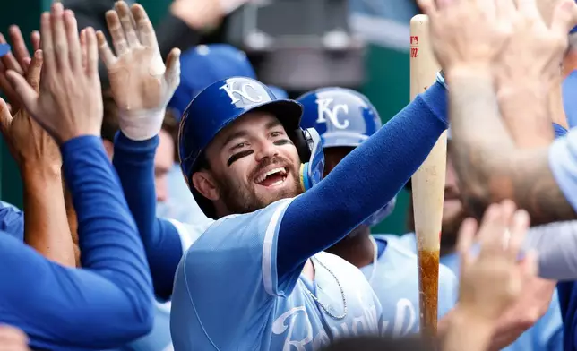 Kansas City Royals' Nick Loftin celebrates in the dugout after his three-run home run during the second inning of a baseball game against the Detroit Tigers in Kansas City, Mo., Sunday, Aug. 23, 2026. (AP Photo/Colin E. Braley)