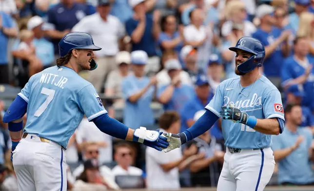 Kansas City Royals' Nick Loftin, right, celebrates after his three-run home run with Bobby Witt Jr. (7) during the second inning of a baseball game against the Detroit Tigers in Kansas City, Mo., Sunday, Aug. 23, 2026. (AP Photo/Colin E. Braley)