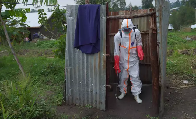 Wiza Bondele, a health worker on the prevention and control team, seen at work in Ituri province, eastern Congo, Wednesday, Aug 5, 2026. (AP Photo/Dieudonne Dirole)