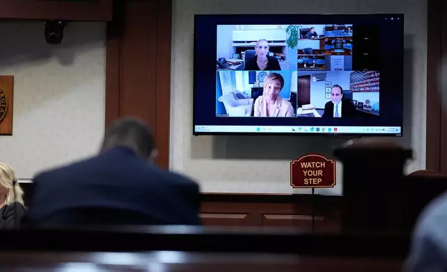 Comedian and actor Tiffany Haddish appears via Zoom for trial on DUI charges Tuesday, Aug. 11, 2026, in Fayetteville, Ga. (AP Photo/Brynn Anderson)