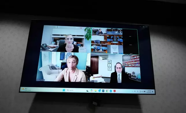 Comedian and actor Tiffany Haddish, along with her attorneys, appears via Zoom for her DUI trial Tuesday, Aug. 11, 2026, in Fayetteville, Ga. (AP Photo/Brynn Anderson)