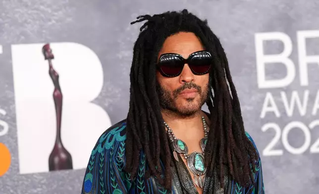 FILE - Lenny Kravitz poses for photographers upon arrival at the Brit Awards 2025 in London, March. 1, 2025. (Photo by Scott A Garfitt/Invision/AP, File)