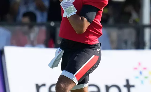 Houston Texans quarterback C.J. Stroud works out during a joint practice with the Las Vegas Raiders at the NFL football training camp Tuesday, Aug. 18, 2026, in Houston. (AP Photo/Ashley Landis)