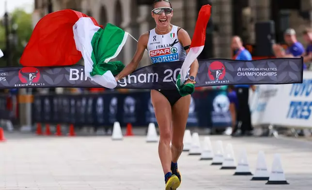 Italy's Sofia Fiorini wins the women's marathon walk at the European Athletics Championships in Birmingham, England, Saturday, Aug. 15, 2026. (AP Photo/Morgan Harlow)