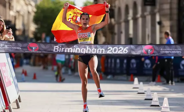 Spain's Maria Perez wins the women's half marathon walk at the European Athletics Championships in Birmingham, England, Saturday, Aug. 15, 2026. (AP Photo/Morgan Harlow)