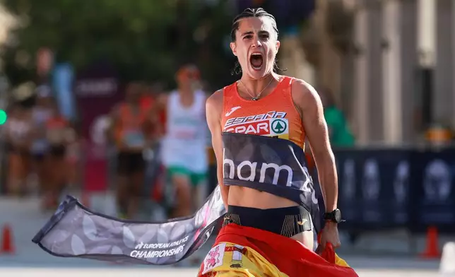 Spain's Maria Perez wins the women's half marathon walk at the European Athletics Championships in Birmingham, England, Saturday, Aug. 15, 2026. (AP Photo/Morgan Harlow)