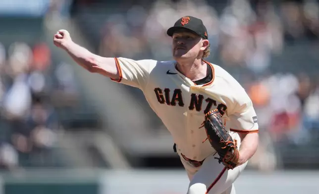 San Francisco Giants pitcher Logan Webb throws against the Cincinnati Reds during the first inning of a baseball game, Wednesday, Aug. 26, 2026, in San Francisco. (AP Photo/Jeff Chiu)